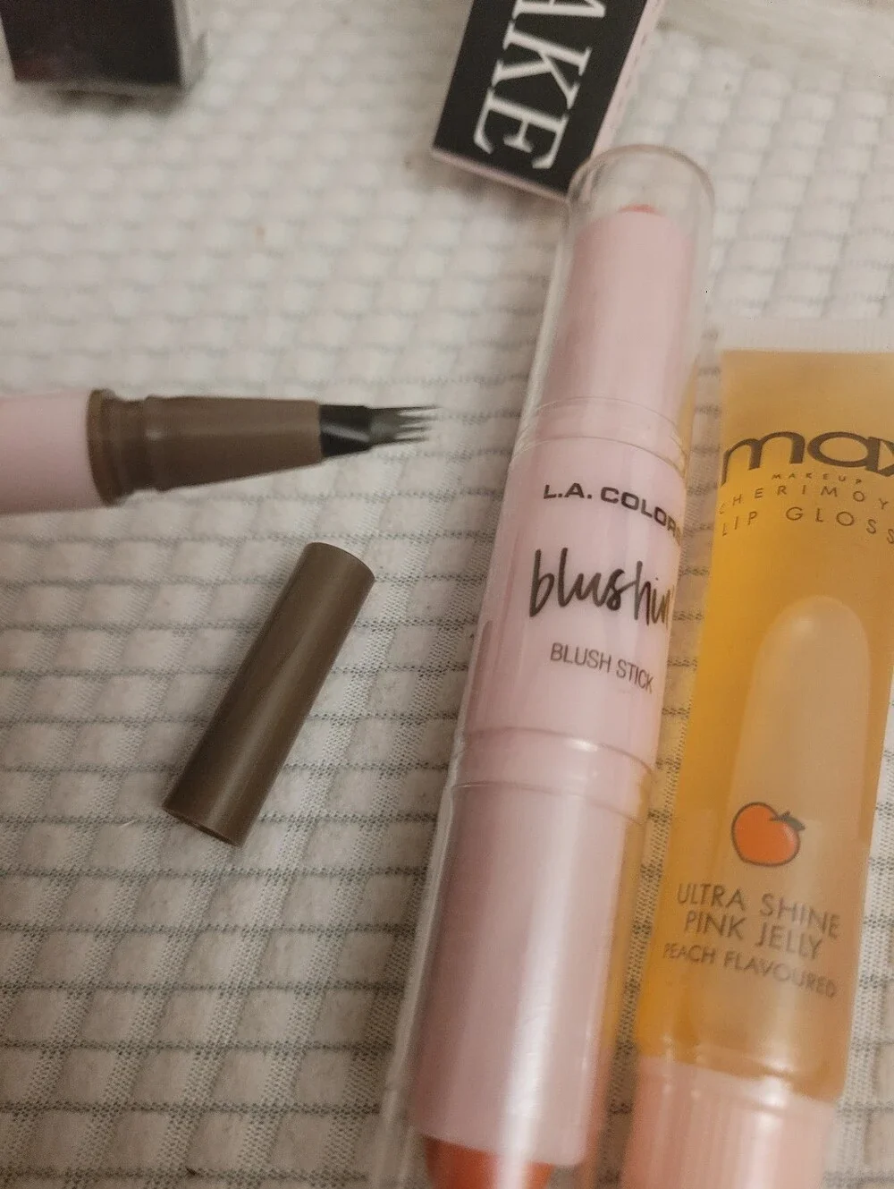L.A. Colors Blushin' Stick, Lip Gloss, And Eyebrow Pen